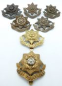 Seven British Army East Yorkshire Regiment metal hat badges