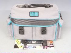 Olympus OM-1 N SLR camera with Olympus 50mm 1:1.4, Zeiss f=2.8 1:2.8 and Makinon 1:4.5 f=80-200mm