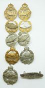 Ten Tank Corps metal badges including four facing pairs