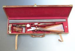 Charles Boswell 12 bore side by side shotgun with named and engraved locks, finely engraved