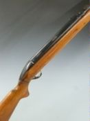 Unnamed .22 air rifle with semi-pistol grip, serial number GD20756.