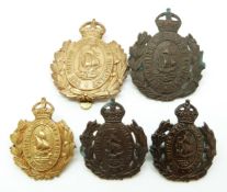 Five British Commonwealth British West Indies Regiment metal cap and collar badges, one by Firmin of