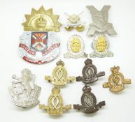 Twelve Australian Military College and Cadet Corps metal hat and collar badges including an
