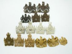 Fifteen British Army Intelligence and General Service Corps metal collar badges in six pairs plus