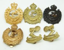 Four New Zealand Army 3rd Auckland Regiment Countess of Ranfurly's Own metal cap badges together