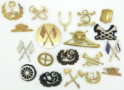 Nineteen British Army proficiency/trade badges including Lewis Gunner, Gun Layer, Driver etc