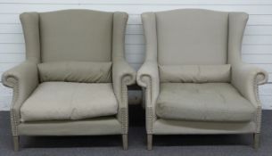 Pair of Swedish upholstered wing back armchairs