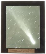 Four early 20th century glass plate positives of comets, one marked Royal Observatory Greenwich,