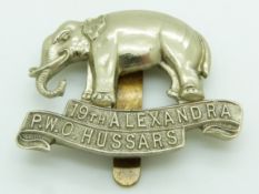 British Army 19th Hussars (Alexandra PWO) double scroll metal cap badge