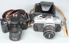 Mamiya/Sekor 500 TL camera with 35mm 1:20,8 Vivitar auto wide angle lens, and a Canon EOS 700