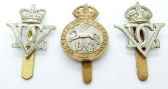 Three British Army 5th Dragoon Guards metal cap badges