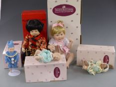 Five Ashton-Drake dolls Cute As A Button, Chen and three others, all in original boxes.