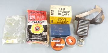 A small collection of air rifle and pistol pellets and accessories including scope mounts and