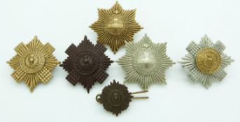 Six British Army Coldstream Guards and Scots Guards metal hat badges