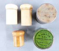 Five various percussion cap tins comprising a turned bone pair, a turned wooden example, F Joyce &