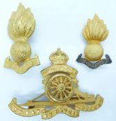 British Army Royal Artillery officer's gilt badge together with two collar badges