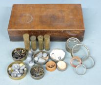 Four Eley-Kynoch 10 bore brass rifle cartridge cases together with associated bullet and various gun