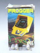 Konami Frogger tabletop mini arcade game, in original box with three Diall batteries.