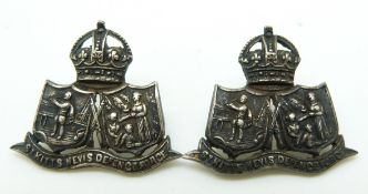 British Overseas Territory St Kitts and Nevis Defence Force pair of officer's metal collar badges