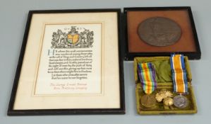 WWI medal pair and memorial plaque awarded to 7280 Pte George Ernest Barnes H.A.C-Inf, cap badge and