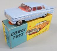 Corgi Toys diecast model Chevrolet Impala with lilac body and red interior, 220, in original box.