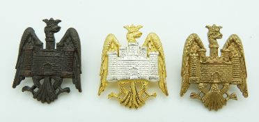 Three British Army Bedfordshire Yeomanry cap badges including an officer's gilt example