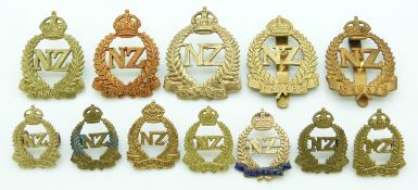 Twelve New Zealand Army WWI New Zealand Expeditionary Force metal hat and collar badges including an