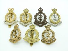 Seven British Army Royal Army Medical Corps metal cap badges, one marked for Gaunt