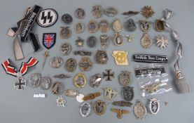 Quantity replica Nazi German insignia and medals including Luftwaffe, Kriegsmarine etc