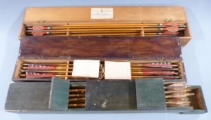 A collection of approximately 31 vintage archery arrows, in three wooden cases including Thomas