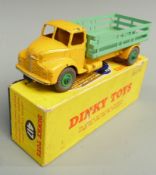 Dinky Toys diecast model Leyland Comet Lorry with yellow cab and chassis, mint green bed and green