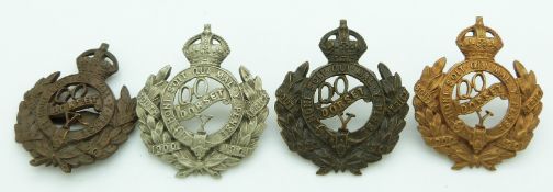 Four British Army Queen's Own Dorset Yeomanry metal cap badges including a bronze example