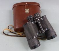A pair of Carl Zeiss Jena Jenoptem 10x50w binoculars, in leather case