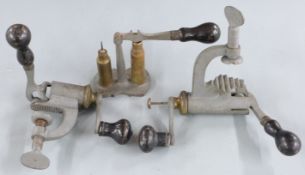 Three shotgun cartridge reloading tools comprising two 12 bore rollover tools, one 12 bore the other