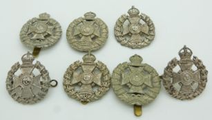Seven British Army Rifle Brigade metal hat badges