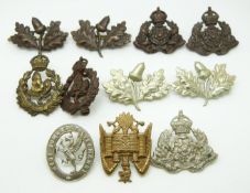 Eleven British Army Derbyshire Yeomanry and Worcesterhire Yeomanry etc metal collar badges in