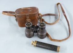 Leather cased vintage binoculars and a small two draw telescope