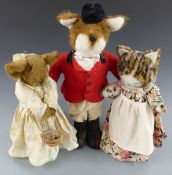 Three large Teddy bears with heavy weighted bases, one in the form of a fox 57cm tall.