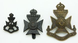 Three British Army 12th County of London Brigade (The Rangers) badges including a blackened example