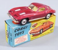 Corgi Toys diecast model Chevrolet Corvette Sting Ray with metallic red body and lemon interior,