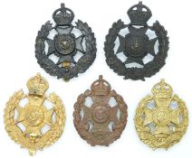 Five British Army West Yorkshire Regiment 7th/8th Battalion Leeds Rifles metal badges