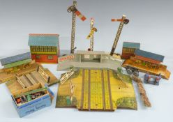 A collection of mainly Hornby 0 gauge tinplate lineside accessories and track including double level