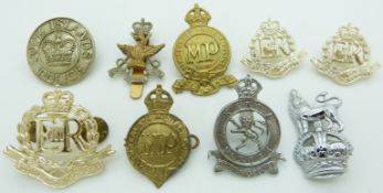 Nine Colonial Police badges including Kenya, Cook Islands, New Zealand etc, three by Gaunt