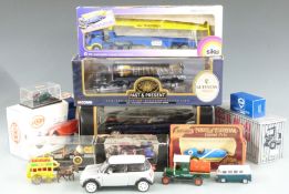 Thirteen Burago, Corgi, Siku and similar diecast model vehicles including Guinness, lorries,
