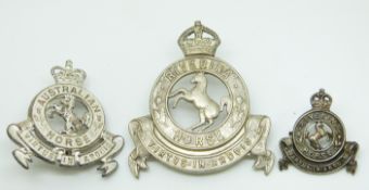 Three Australian Army Riverina Horse metal badges bearing the motto 'Virtus in Arduis'
