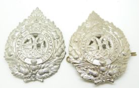 Two Australian Army Byron Scottish metal hat badges, both by Stoke