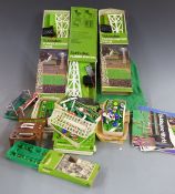 A collection of Subbuteo teams and accessories including floodlights, scoreboard etc, some in
