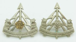 Two British Army Reconnaissance Corps West Riding Division metal cap badges
