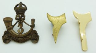 Three 3rd King's African Rifles metal/anodised badges one by Firmin, London another J R Gaunt