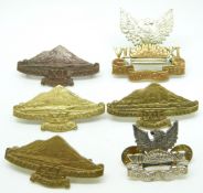 New Zealand Army 11th Taranaki Rifles Regiment metal badges together with two 7th/11th Wellington